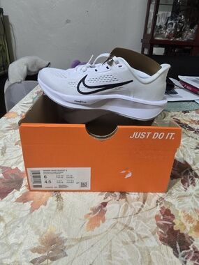 Nike Kids White Sneakers with Black Swoosh
